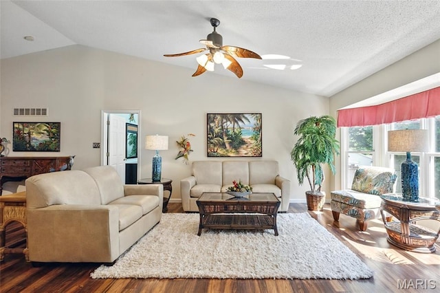 105 Silo Valley Dr, Wentzville, MO 63385 - living room featuring lofted ceiling, ceiling fan, and dark wood-type flooring