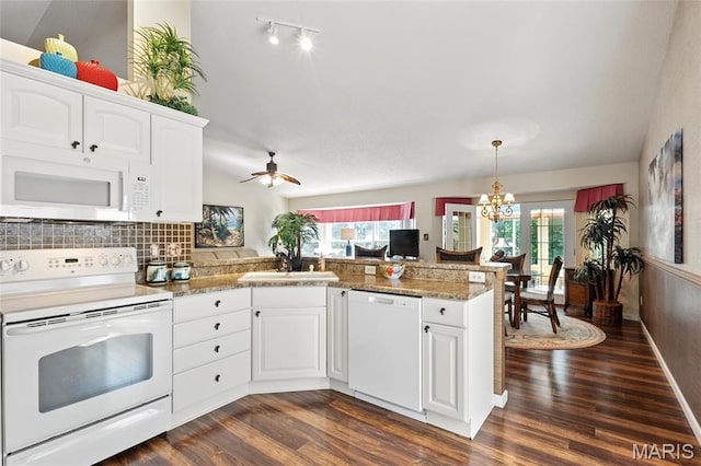105 Silo Valley Dr, Wentzville, MO 63385 - kitchen with white appliances, a peninsula, dark wood-style flooring, healthy amount of natural light, and lofted ceiling