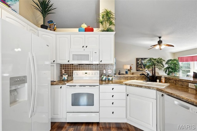 105 Silo Valley Dr, Wentzville, MO 63385 - kitchen featuring white appliances, white cabinetry, a ceiling fan, decorative backsplash, and dark wood-style floors