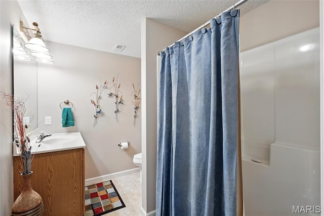 105 Silo Valley Dr, Wentzville, MO 63385 - bathroom with vanity, a textured ceiling, and a shower with shower curtain