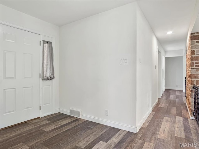 68 Carnation Dr, Belleville, IL 62221 - foyer entrance with wood finished floors, baseboards, and a large fireplace