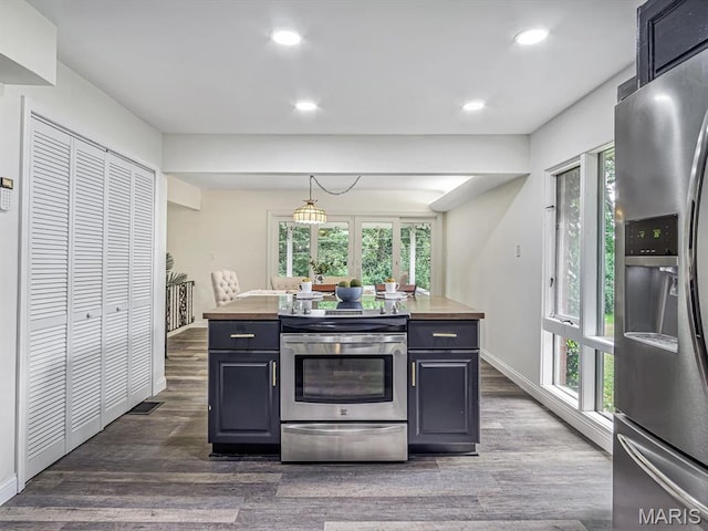 68 Carnation Dr, Belleville, IL 62221 - kitchen with stainless steel appliances, butcher block counters, dark wood-type flooring, recessed lighting, and baseboards