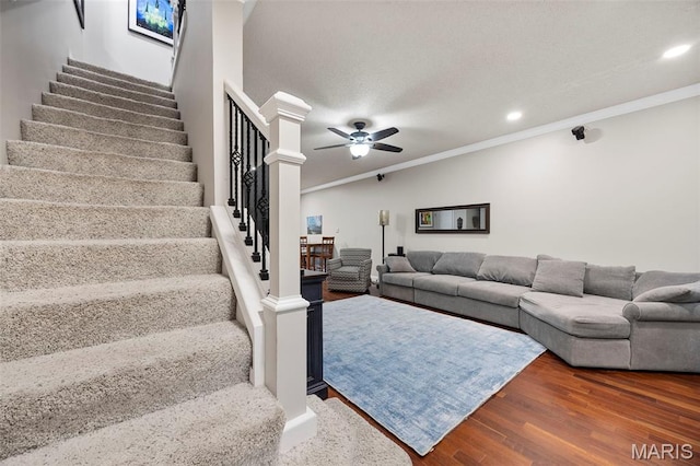 3216 Domain St, Saint Charles, MO 63301 - living room featuring stairs, wood finished floors, ornamental molding, ceiling fan, and recessed lighting