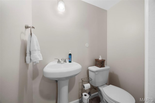 3216 Domain St, Saint Charles, MO 63301 - bathroom with toilet and baseboards