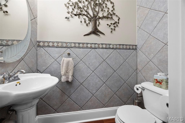 3216 Domain St, Saint Charles, MO 63301 - bathroom featuring tile walls and toilet