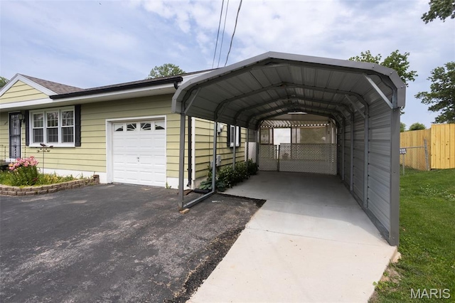529 Maple Meadows Dr, Arnold, MO 63010 - view of car parking with asphalt driveway, an attached garage, and a carport