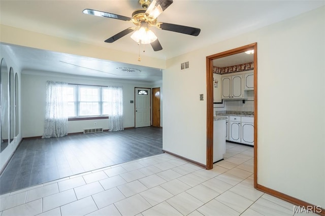 529 Maple Meadows Dr, Arnold, MO 63010 - unfurnished room with ceiling fan, baseboards, and light wood finished floors