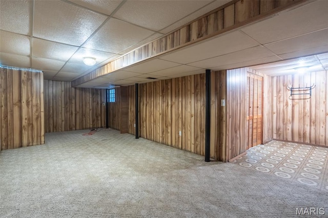 529 Maple Meadows Dr, Arnold, MO 63010 - finished below grade area featuring a drop ceiling, carpet floors, and wood walls