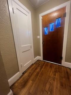 408 Summit, Doniphan, MO 63935 - doorway to outside with wood finished floors, crown molding, and baseboards