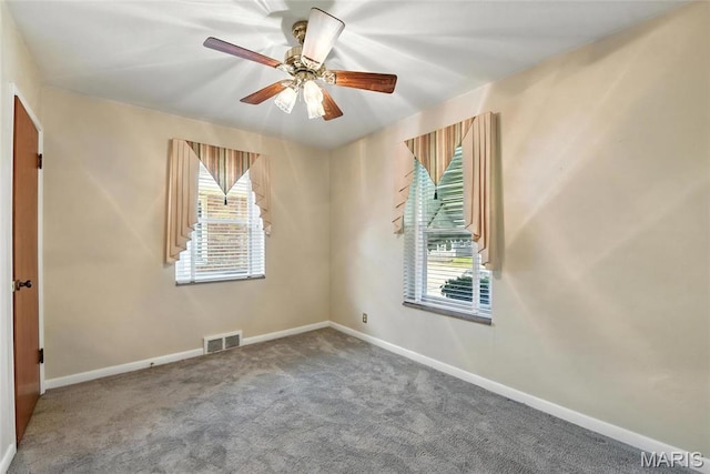 6912 Hampton Ave, Saint Louis, MO 63109 - carpeted empty room with healthy amount of natural light and ceiling fan