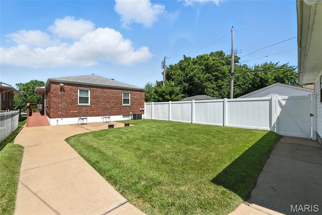 6912 Hampton Ave, Saint Louis, MO 63109 - fenced backyard with a gate and a patio area