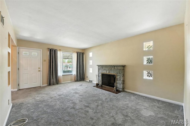 6912 Hampton Ave, Saint Louis, MO 63109 - unfurnished living room with carpet flooring and a fireplace
