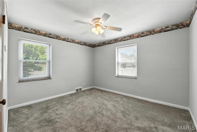6912 Hampton Ave, Saint Louis, MO 63109 - carpeted empty room featuring baseboards and a ceiling fan