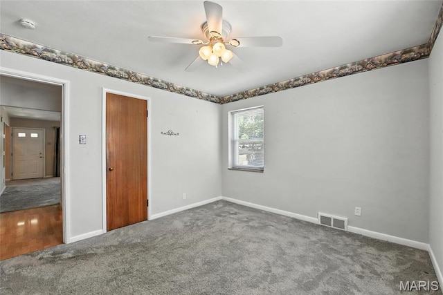 6912 Hampton Ave, Saint Louis, MO 63109 - unfurnished bedroom featuring carpet floors and ceiling fan