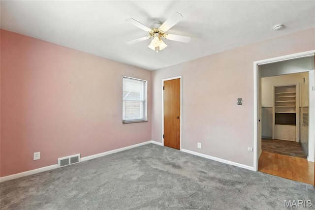 6912 Hampton Ave, Saint Louis, MO 63109 - unfurnished bedroom featuring carpet flooring and ceiling fan