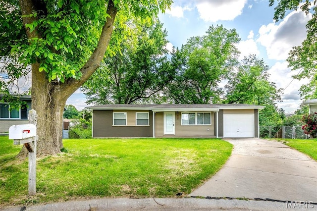36 Huck Finn Dr, Saint Charles, MO 63303 - view of front of property featuring an attached garage and concrete driveway