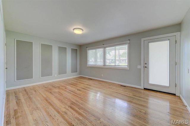 36 Huck Finn Dr, Saint Charles, MO 63303 - spare room with light wood finished floors and baseboards