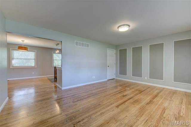 36 Huck Finn Dr, Saint Charles, MO 63303 - spare room with light wood-style floors and baseboards