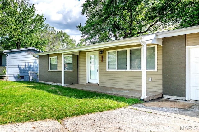36 Huck Finn Dr, Saint Charles, MO 63303 - view of front of property with a front yard and brick siding