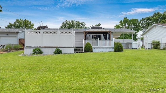 995 Sherman Ln, Florissant, MO 63031 - back of house with a gazebo