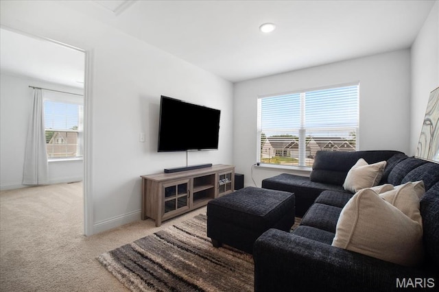 251 Randlin Dr, Ofallon, MO 63367 - living room with plenty of natural light and light colored carpet