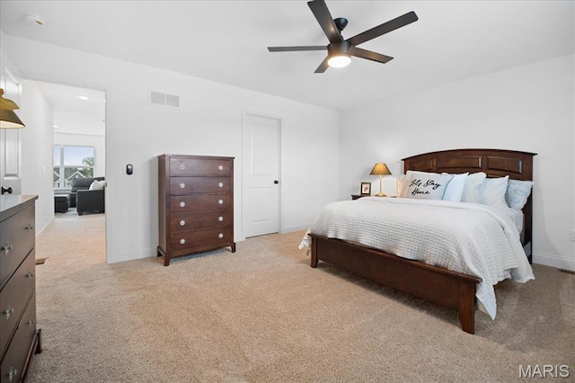 251 Randlin Dr, Ofallon, MO 63367 - bedroom featuring light colored carpet and a ceiling fan