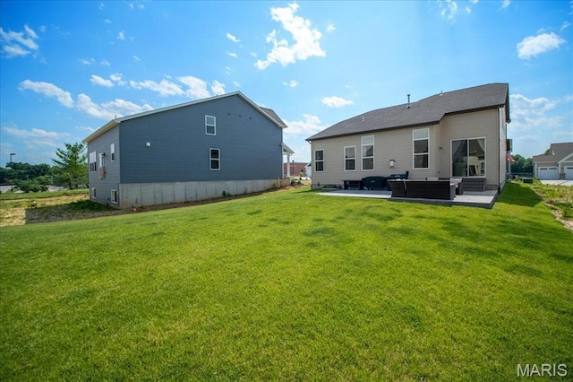 251 Randlin Dr, Ofallon, MO 63367 - rear view of property with a patio area and a yard