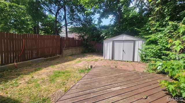155 E Etta Ave, Saint Louis, MO 63125 - wooden terrace with a fenced backyard and a storage shed