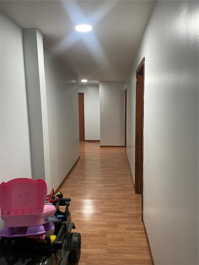 715 Lyon St, Hannibal, MO 63401 - hall with light wood-style flooring and recessed lighting