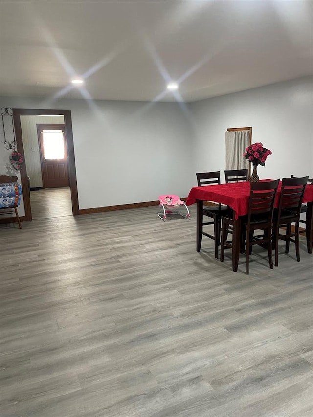 715 Lyon St, Hannibal, MO 63401 - dining room with baseboards and wood finished floors