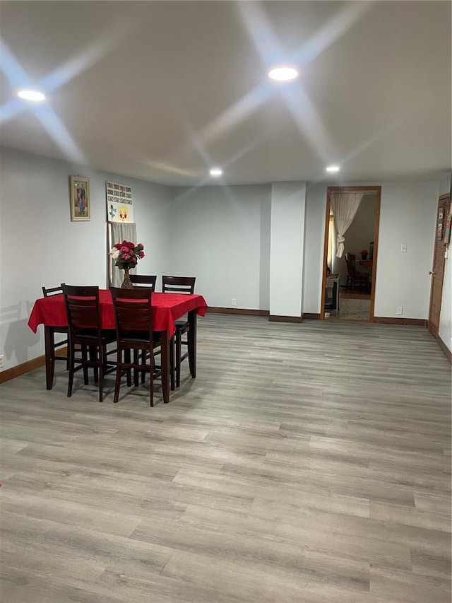 715 Lyon St, Hannibal, MO 63401 - dining room featuring baseboards, wood finished floors, and recessed lighting