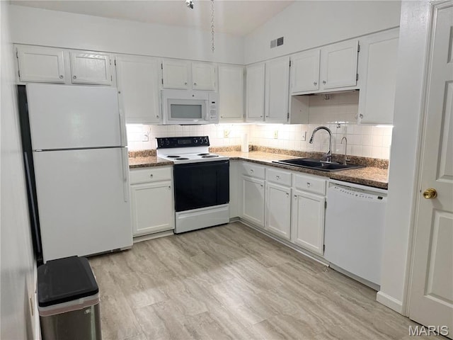 905 Hanna Place Ct Unit C, Manchester, MO 63021 - kitchen featuring white appliances, a sink, white cabinets, backsplash, and light floors