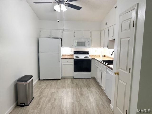 905 Hanna Place Ct Unit C, Manchester, MO 63021 - kitchen featuring white appliances, a sink, ceiling fan, white cabinetry, and backsplash