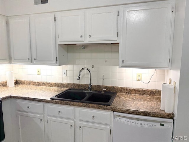 905 Hanna Place Ct Unit C, Manchester, MO 63021 - kitchen with dishwasher, a sink, and white cabinets