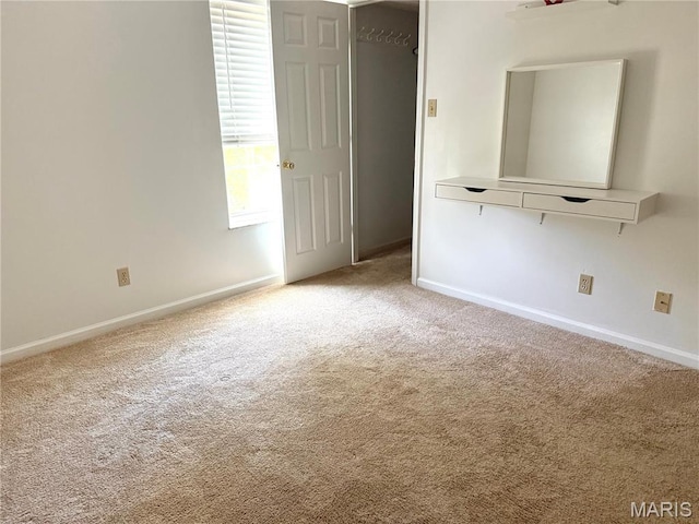 905 Hanna Place Ct Unit C, Manchester, MO 63021 - unfurnished bedroom with carpet flooring and baseboards