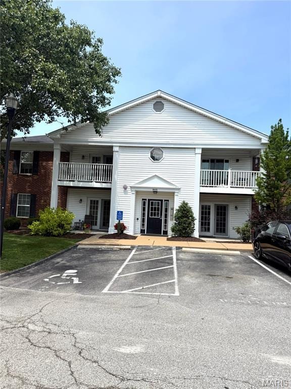 905 Hanna Place Ct Unit C, Manchester, MO 63021 - view of building exterior with uncovered parking