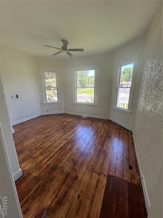 126 N Union St, Staunton, IL 62088 - spare room with a textured wall, hardwood / wood-style flooring, and ceiling fan