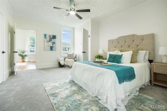 126 N Union St, Staunton, IL 62088 - bedroom with carpet floors, a textured ceiling, and ceiling fan
