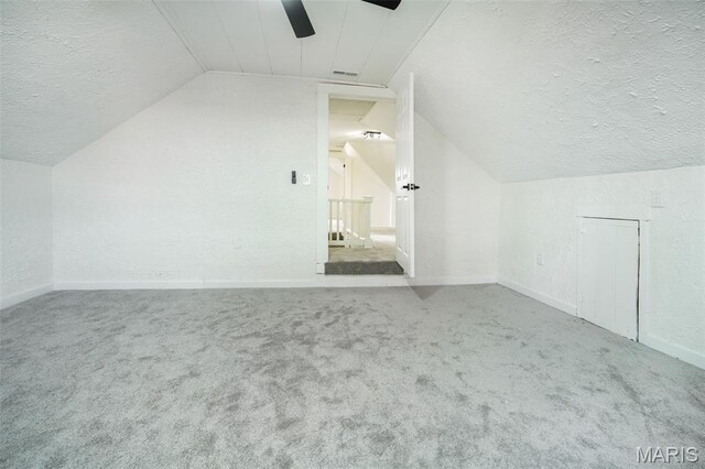 126 N Union St, Staunton, IL 62088 - additional living space featuring a textured ceiling, vaulted ceiling, ceiling fan, carpet flooring, and a textured wall