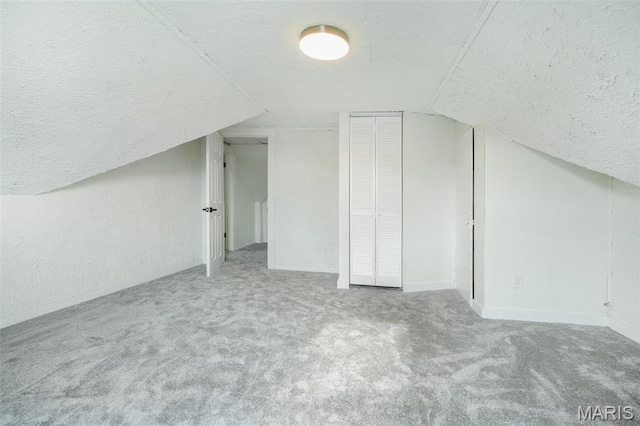 126 N Union St, Staunton, IL 62088 - bonus room with a textured ceiling, lofted ceiling, and carpet