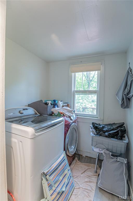 870 Walnut St, Newburg, MO 65550 - washroom featuring independent washer and dryer, wood finished floors, and baseboards