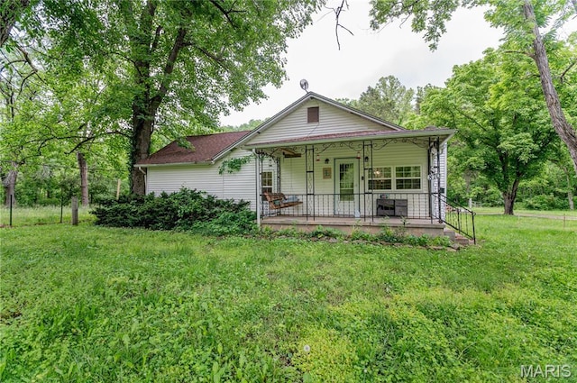 870 Walnut St, Newburg, MO 65550 - view of front of house featuring covered porch and a front lawn