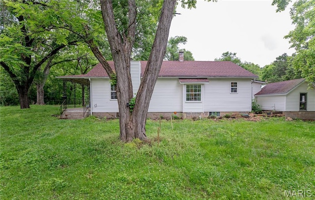 870 Walnut St, Newburg, MO 65550 - rear view of house featuring a chimney and a lawn