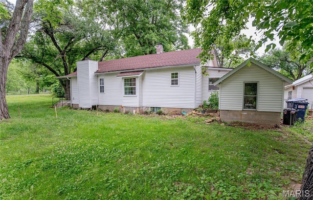 870 Walnut St, Newburg, MO 65550 - back of house with a chimney and a lawn
