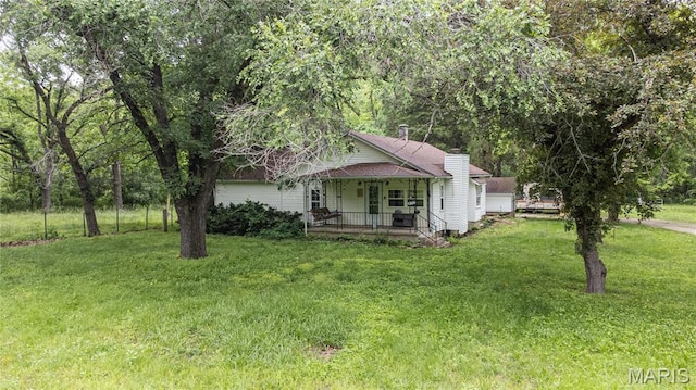 870 Walnut St, Newburg, MO 65550 - view of front of property featuring covered porch, a front yard, and a chimney