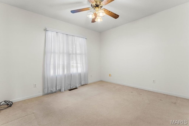 1500 Birch Ct, Edwardsville, IL 62025 - carpeted empty room with a ceiling fan and baseboards