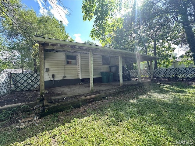 425 Crawford Rd, Riverview, MO 63137 - rear view of house with a patio