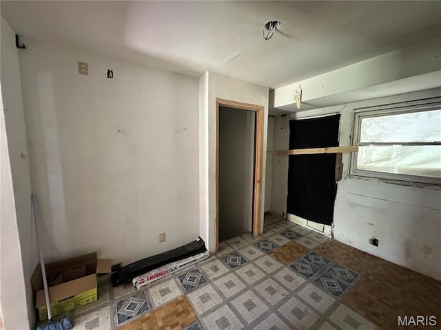 425 Crawford Rd, Riverview, MO 63137 - unfurnished bedroom featuring a closet and light flooring