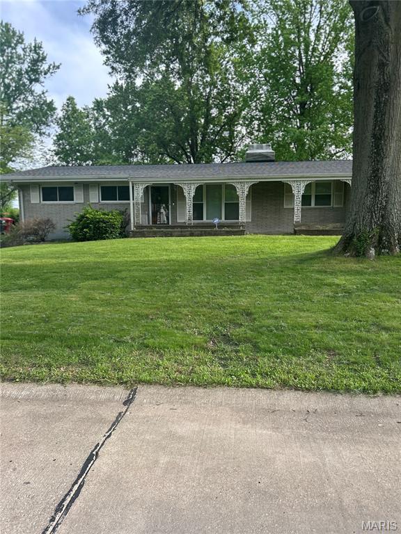 1548 Bayonne Dr, Saint Louis, MO 63138 - ranch-style house featuring a front lawn and covered porch