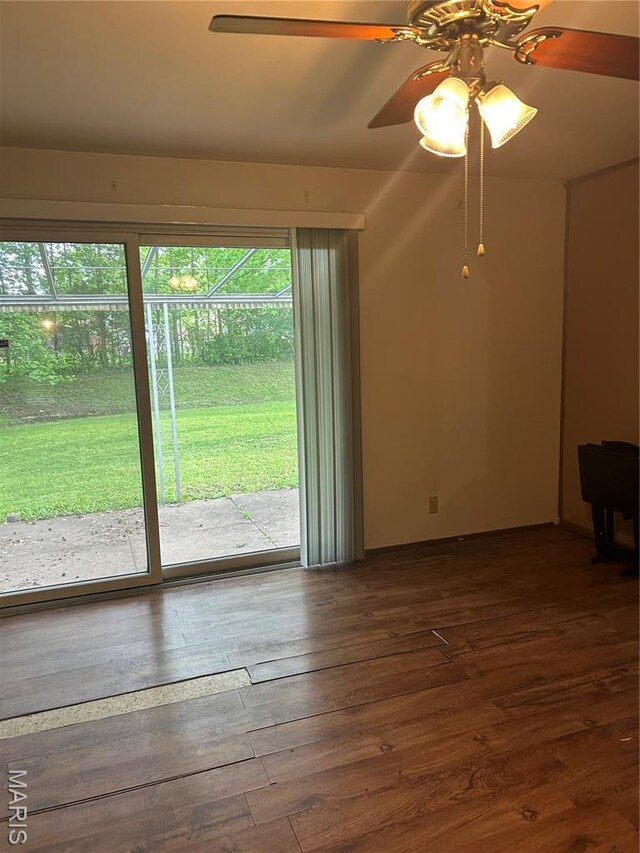 1548 Bayonne Dr, Saint Louis, MO 63138 - spare room featuring dark wood-style floors and ceiling fan